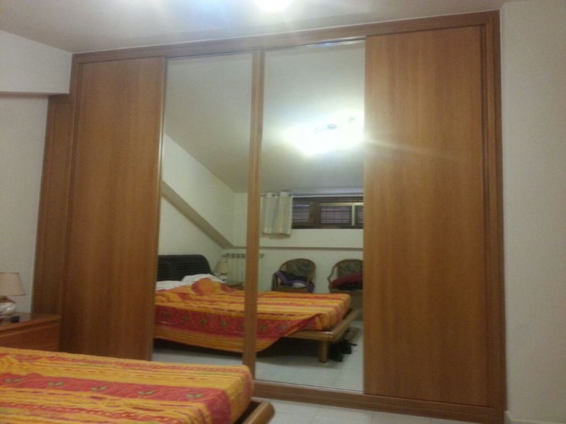 Armadio con 4 Ante Scorrevoli in Legno e su Misura Armadio con 4 Ante Scorrevoli in Legno e su Misura