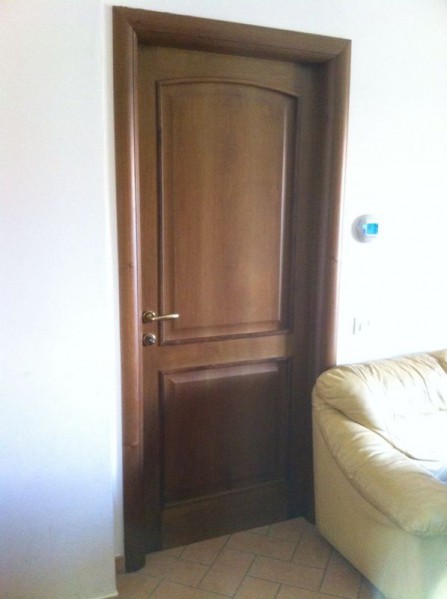 Porte in Legno Massello di Noce Nazionale Porte in Legno Massello di Noce Nazionale